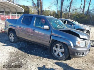 2014 Honda Ridgeline RTL with VIN 5FPYK1F52EB002984, listed as a IAAI auction lot 41347361 with 162,015 mi miles. Bid and sale history available at carsss.com. Image 1.