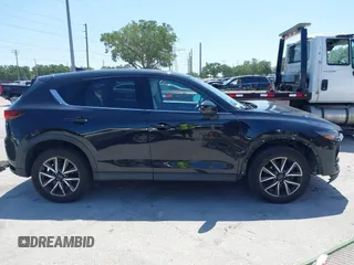 2017 Mazda CX-5 Grand Touring with VIN JM3KFBDL6H0200830, listed as a IAAI auction lot 42005145 with 90,510 mi miles. Bid and sale history available at carsss.com. Image 13.
