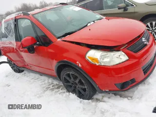 2009 Suzuki SX4 Man Touring Pkg AWD with VIN JS2YB417295101711, listed as a IAAI auction lot 41454641 with 200,540 mi miles. Bid and sale history available at carsss.com. Image 1.