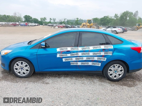2015 Ford Focus SE z VIN 1FADP3F21FL274182, wystawiony jako IAAI lot #42441161 z przebiegiem 176 810 mil mil oraz . Historia ofert i sprzedaży dostępna na DreamBid. Obrazek 15.