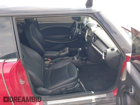 2013 MINI Hardtop with VIN WMWSU3C53DT681729, listed as a IAAI auction lot 42196391 with 128,197 mi miles and . Bid and sale history available at DreamBid. Image 5.