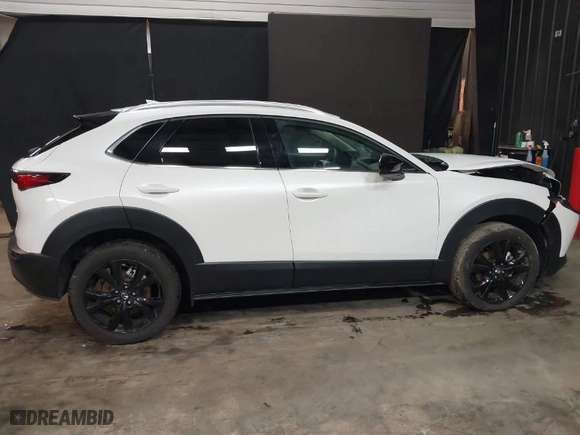 2024 Mazda CX-30 2.5 Turbo Premium Package with VIN 3MVDMBDY7RM706554, listed as a IAAI auction lot 41553002 with 2,817 mi miles. Bid and sale history available at carsss.com. Image 13.