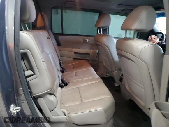 2013 Honda Pilot Touring z VIN 5FNYF3H93DB019252, wystawiony jako Copart lot #64631715 z przebiegiem 134 343 mil mil oraz Szkoda całkowita • Salvage title. Historia ofert i sprzedaży dostępna na DreamBid. Obrazek 11.