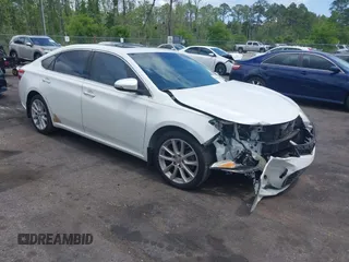 2013 Toyota Avalon XLE with VIN 4T1BK1EB4DU047982, listed as a IAAI auction lot 42011402 with 122,645 mi miles and . Bid and sale history available at DreamBid. Image 1.