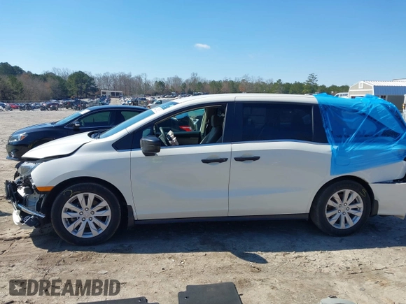2019 Honda Odyssey LX with VIN 5FNRL6H23KB049236, listed as a IAAI auction lot 41633339 with 96,000 mi miles and . Bid and sale history available at DreamBid. Image 14.