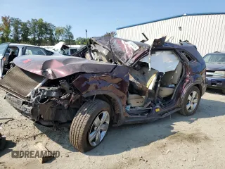 2012 Kia Sorento EX with VIN 5XYKU4A62CG222061, listed as a Copart auction lot 71044124 with 218,770 mi miles and Salvage Title. Bid and sale history available at carsss.com. Image 1.