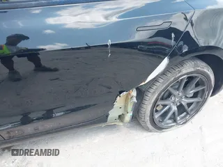 2023 Tesla Model 3 z VIN 5YJ3E1EA0PF571330, wystawiony jako IAAI lot #42198817 z przebiegiem 39 682 mil mil oraz . Historia ofert i sprzedaży dostępna na DreamBid. Obrazek 6.