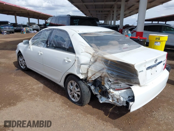 2004 Toyota Camry LE with VIN 4T1BF30K54U071960, listed as a IAAI auction lot 41513417 with 165,738 mi miles. Bid and sale history available at carsss.com. Image 3.
