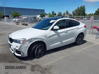 2015 BMW X4 xDrive28i with VIN 5UXXW3C5XF0M89147, listed as a IAAI auction lot 42779290 with 120,773 mi miles and . Bid and sale history available at DreamBid. Image 16.