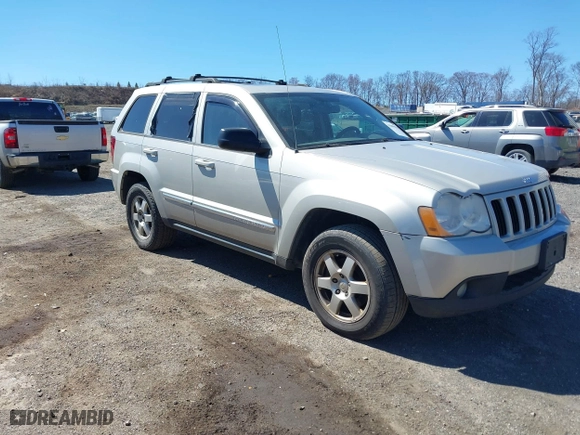 2010 Jeep Grand Cherokee Laredo with VIN 1J4PR4GK2AC125918, listed as a IAAI auction lot 41899078 with 236,229 mi miles. Bid and sale history available at carsss.com. Image 1.