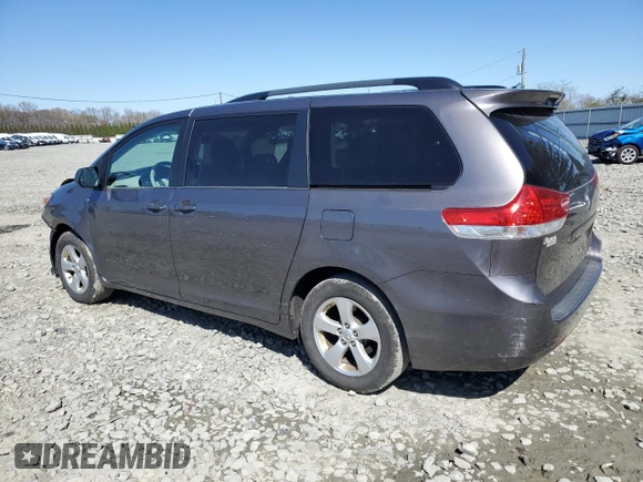 2014 Toyota Sienna LE AAS with VIN 5TDKK3DC6ES511466, listed as a Copart auction lot 52517555 with 142,744 mi miles and Salvage Title. Bid and sale history available at DreamBid. Image 2.