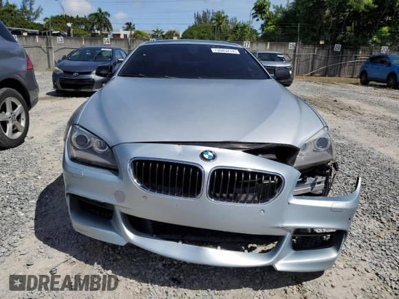 2013 BMW 6 Series 650i with VIN WBAYM9C59DDW20408, listed as a Copart auction lot 73585214 with 143,605 mi miles and Clean Title. Bid and sale history available at carsss.com. Image 5.