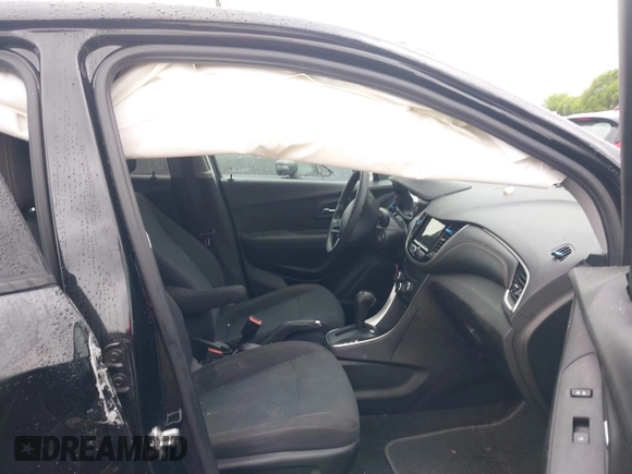 2019 Chevrolet Trax LS with VIN 3GNCJNSB7KL357677, listed as a IAAI auction lot 41897552 with 96,323 mi miles and . Bid and sale history available at DreamBid. Image 5.