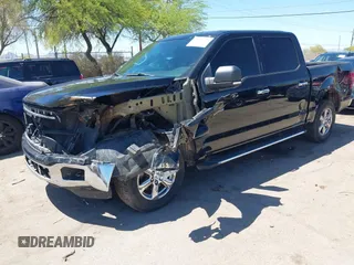 2018 Ford F-150 XL with VIN 1FTEW1C50JKF28600, listed as a IAAI auction lot 42081191 with 105,636 mi miles and . Bid and sale history available at DreamBid. Image 18.