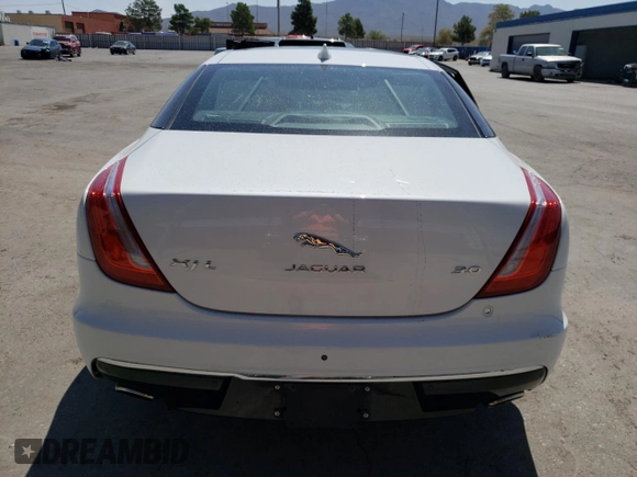 2019 Jaguar XJ Portfolio with VIN SAJWA2G72K8W21087, listed as a Copart auction lot 66017344 with 22,671 mi miles and Salvage Title. Bid and sale history available at DreamBid. Image 6.