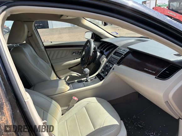 2010 Ford Taurus Limited with VIN 1FAHP2FW3AG125031, listed as a IAAI auction lot 42801338 with 128,310 mi miles and . Bid and sale history available at DreamBid. Image 5.