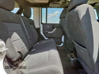 2012 Jeep Wrangler Unlimited Sport with VIN 1C4BJWDG9CL187421, listed as a Copart auction lot 61411145 with 140,390 mi miles and Clean title. Bid and sale history available at DreamBid. Image 11.