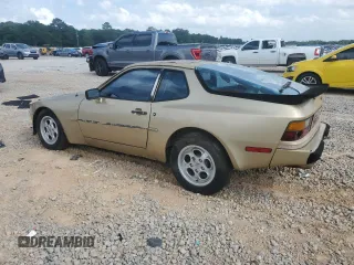 1984 Porsche 944 z VIN WP0AA0940EN458560, wystawiony jako Copart lot #59191935 z przebiegiem 85 420 mil mil oraz Czysty tytuł • Clean title. Historia ofert i sprzedaży dostępna na DreamBid. Obrazek 2.