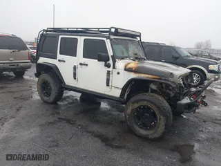 2016 Jeep Wrangler Unlimited Rubicon with VIN 1C4BJWFGXGL185227, listed as a IAAI auction lot 41555159 with 1 mi miles. Bid and sale history available at carsss.com. Image 1.
