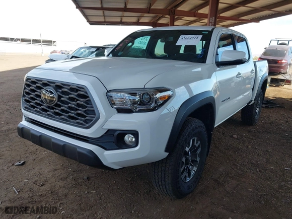 2023 Toyota Tacoma 4WD SR with VIN 3TMCZ5AN8PM650793, listed as a IAAI auction lot 41664712 with 9,427 mi miles. Bid and sale history available at carsss.com. Image 2.