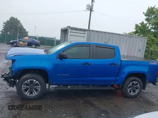 2022 Chevrolet Colorado 4WD Z71 z VIN 1GCGTDEN7N1124379, wystawiony jako IAAI lot #42372796 z przebiegiem 60 943 mil mil oraz . Historia ofert i sprzedaży dostępna na DreamBid. Obrazek 15.