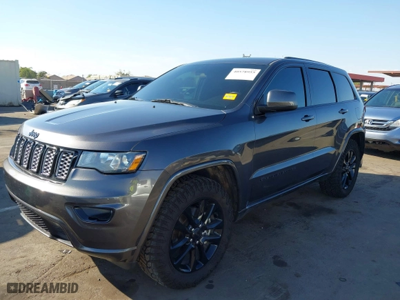 2021 Jeep Grand Cherokee Laredo X with VIN 1C4RJEAG2MC785610, listed as a IAAI auction lot 40578955 with 58,213 mi miles. Bid and sale history available at carsss.com. Image 17.