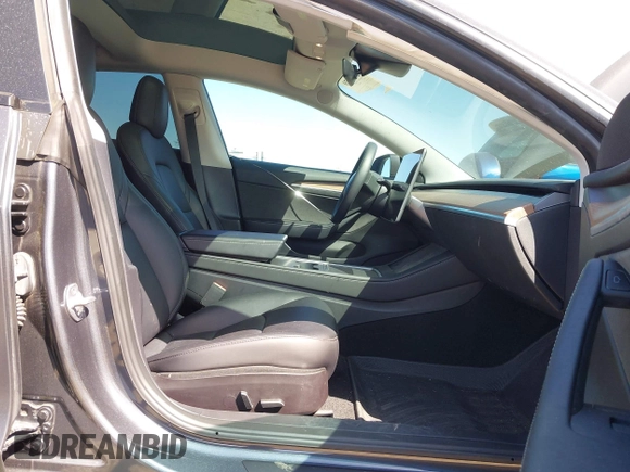 2023 Tesla Model 3 z VIN 5YJ3E1EA2PF404614, wystawiony jako IAAI lot #42009539 z przebiegiem 22 105 mil mil oraz . Historia ofert i sprzedaży dostępna na DreamBid. Obrazek 5.