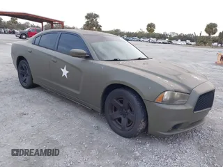 2014 Dodge Charger Police with VIN 2C3CDXAG9EH221609, listed as a IAAI auction lot 41324904 with Not Provided miles and . Bid and sale history available at DreamBid. Image 1.