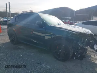 2021 Alfa Romeo Stelvio Ti z VIN ZASPAKBN4M7D02587, wystawiony jako IAAI lot #41379209 z przebiegiem 52 427 mil mil oraz . Historia ofert i sprzedaży dostępna na DreamBid. Obrazek 1.