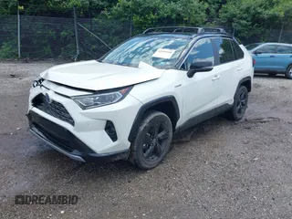 2021 Toyota RAV4 Hybrid XSE with VIN 4T3E6RFV9MU052563, listed as a IAAI auction lot 42295510 with 24,771 mi miles and . Bid and sale history available at DreamBid. Image 2.