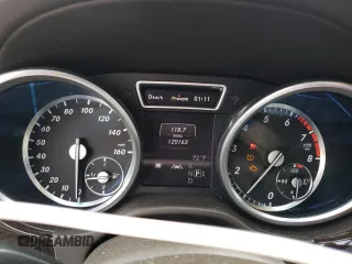 2013 Mercedes-Benz GL 450 z VIN 4JGDF7CE5DA249440, wystawiony jako Copart lot #57466825 z przebiegiem 120 163 mil mil oraz Tytuł czysty. Historia ofert i sprzedaży dostępna na DreamBid. Obrazek 9.