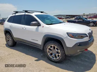 2020 Jeep Cherokee Trailhawk с VIN 1C4PJMBX4LD609103, выставлен на аукционе Copart как лот 60469955 с пробегом 70 179 миль миль и Списание • Salvage title. История ставок и продаж доступна на DreamBid. Изображение 4.