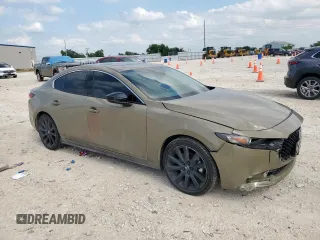 2024 Mazda 3 Carbon Edition with VIN 3MZBPBXYXRM409075, listed as a Copart auction lot 59189265 with 23,114 mi miles and Salvage title. Bid and sale history available at DreamBid. Image 4.