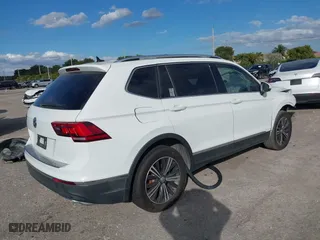 2019 Volkswagen Tiguan SE with VIN 3VV3B7AX9KM067418, listed as a IAAI auction lot 41434045 with 96,968 mi miles. Bid and sale history available at carsss.com. Image 4.