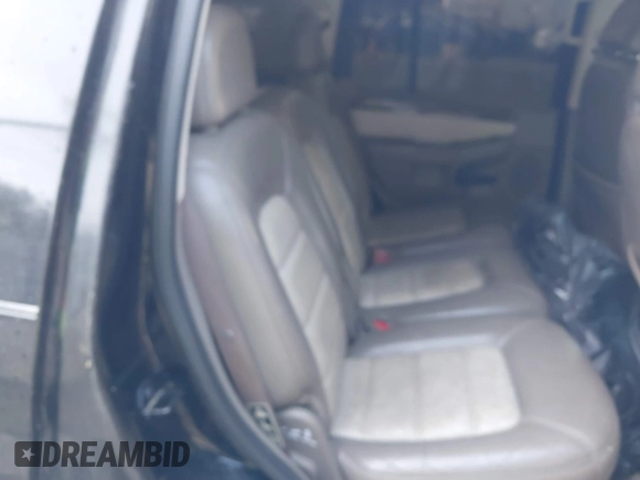 2002 Ford Explorer Eddie Bauer with VIN 1FMZU74W92ZB32879, listed as a IAAI auction lot 39327971 with 128,592 mi miles and . Bid and sale history available at DreamBid. Image 8.
