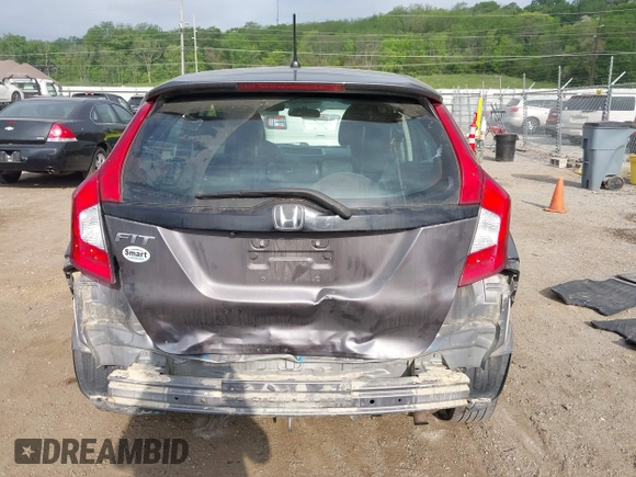 2015 Honda Fit LX with VIN 3HGGK5H58FM722880, listed as a IAAI auction lot 42276261 with 104,886 mi miles and . Bid and sale history available at DreamBid. Image 16.