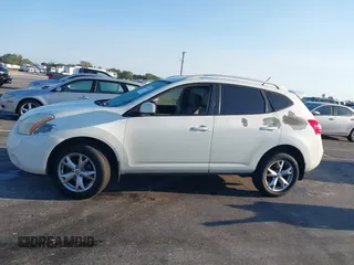 2009 Nissan Rogue SL with VIN JN8AS58T79W329674, listed as a IAAI auction lot 41833891 with 170,396 mi miles and . Bid and sale history available at DreamBid. Image 15.