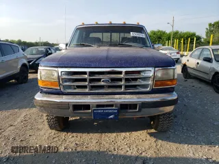 1997 Ford F-350 with VIN 1FTJW36F0VEC59307, listed as a Copart auction lot 62430515 with 199,894 mi miles and Salvage title. Bid and sale history available at DreamBid. Image 5.