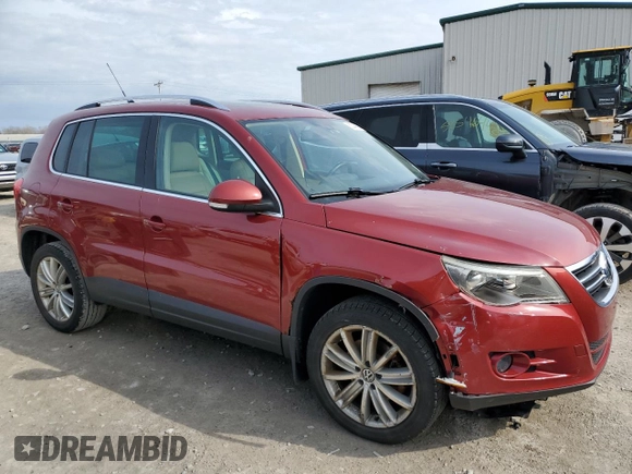 2011 Volkswagen Tiguan SE with VIN WVGBV7AX7BW001124, listed as a Copart auction lot 53044005 with 150,072 mi miles and Salvage Title. Bid and sale history available at DreamBid. Image 4.