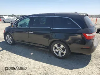 2012 Honda Odyssey Touring with VIN 5FNRL5H95CB004226, listed as a Copart auction lot 55775235 with 157,521 mi miles and Clean Title. Bid and sale history available at DreamBid. Image 2.