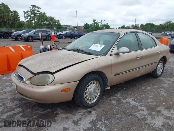 1996 Mercury Sable LS with VIN 1MELM53S6TA606332, listed as a IAAI auction lot 41984196 with 150,924 mi miles and . Bid and sale history available at DreamBid. Image 2.
