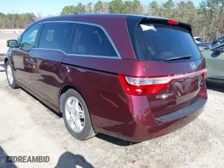2012 Honda Odyssey Touring with VIN 5FNRL5H98CB127230, listed as a IAAI auction lot 41754140 with 122,003 mi miles. Bid and sale history available at carsss.com. Image 3.