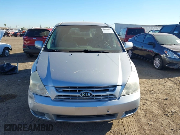 2008 Kia Sedona with VIN KNDMB133686227144, listed as a IAAI auction lot 41868692 with 124,269 mi miles. Bid and sale history available at carsss.com. Image 12.