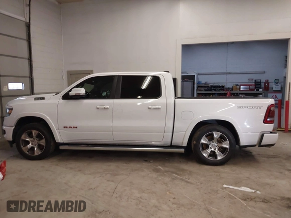2021 Ram 1500 Laramie with VIN 1C6SRFJT6MN671456, listed as a IAAI auction lot 41087757 with 40,593 mi miles and . Bid and sale history available at DreamBid. Image 14.