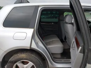 2007 Volkswagen Touareg V6 z VIN WVGZE77L57D001046, wystawiony jako IAAI lot #42283224 z przebiegiem 243 861 mil mil oraz . Historia ofert i sprzedaży dostępna na DreamBid. Obrazek 8.