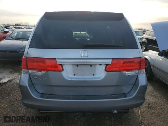 2010 Honda Odyssey EX-L with VIN 5FNRL3H69AB001952, listed as a Copart auction lot 49738155 with 95,721 mi miles and Salvage Title. Bid and sale history available at carsss.com. Image 6.