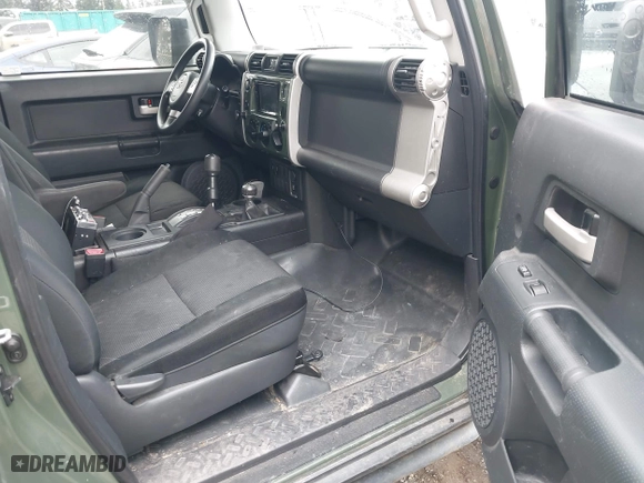 2011 Toyota FJ Cruiser with VIN JTEBU4BF5BK108168, listed as a IAAI auction lot 41829688 with 163,354 mi miles. Bid and sale history available at carsss.com. Image 5.