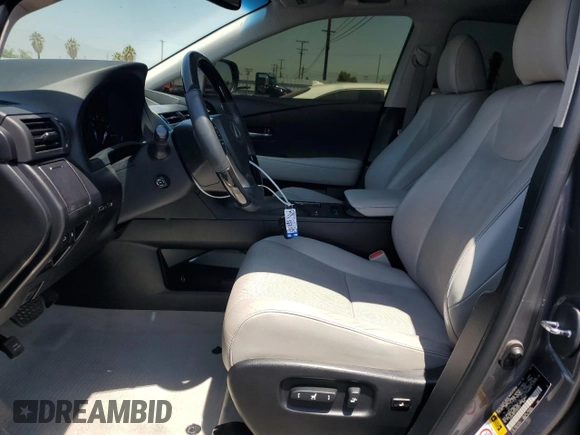 2015 Lexus RX 450h with VIN 2T2ZB1BA1FC001617, listed as a Copart auction lot 61766235 with 79,789 mi miles and Salvage title. Bid and sale history available at DreamBid. Image 7.