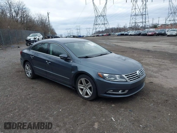 2013 Volkswagen CC Sport with VIN WVWBP7AN8DE513898, listed as a IAAI auction lot 41694857 with 67,440 mi miles. Bid and sale history available at carsss.com. Image 1.