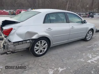 2009 Toyota Avalon XL with VIN 4T1BK36B69U329378, listed as a IAAI auction lot 41387338 with 163,023 mi miles and . Bid and sale history available at carsss.com. Image 4.
